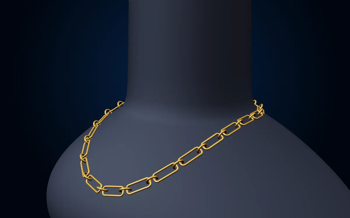 A gold paperclip and rolo chain